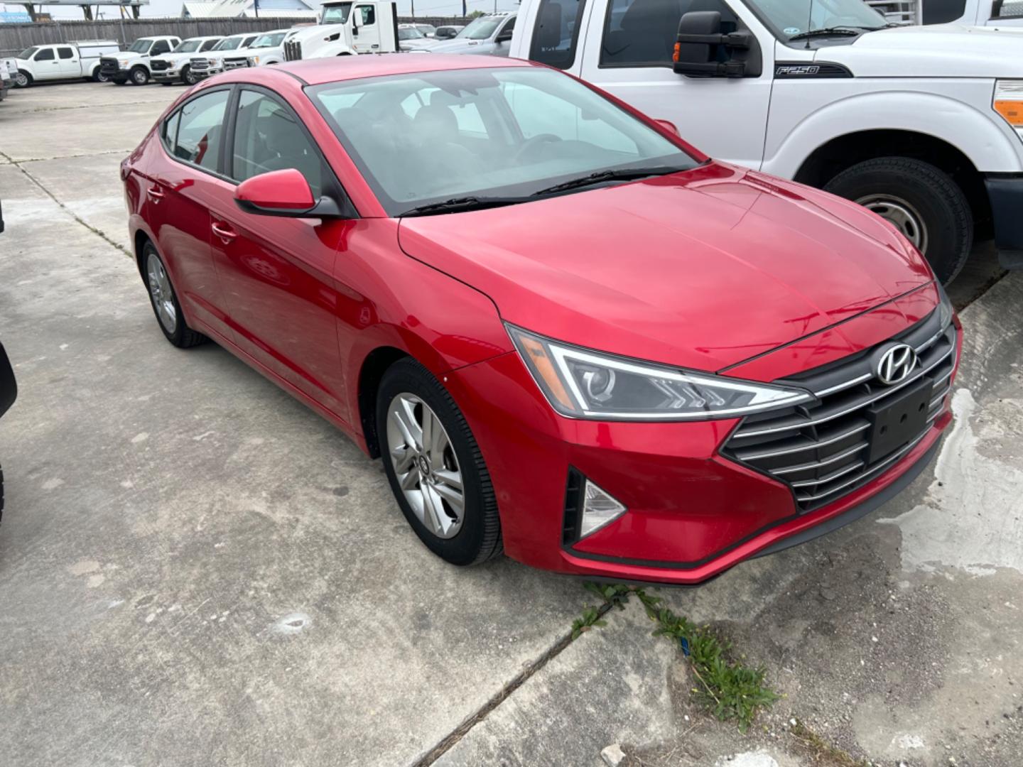 2020 Red Hyundai Elantra Limited (5NPD84LFXLH) with an 1.8L L4 DOHC 16V engine, 6A transmission, located at 1687 Business 35 S, New Braunfels, TX, 78130, (830) 625-7159, 29.655487, -98.051491 - Photo#3